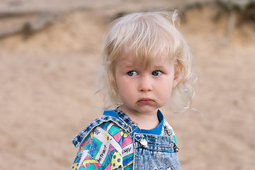 Image showing blonde sad little girl