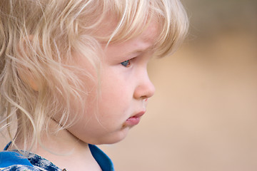 Image showing blonde sad little girl