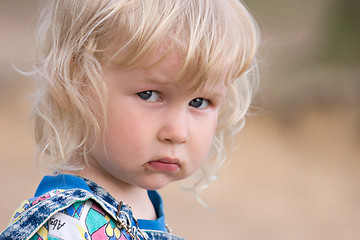 Image showing blonde sad little girl