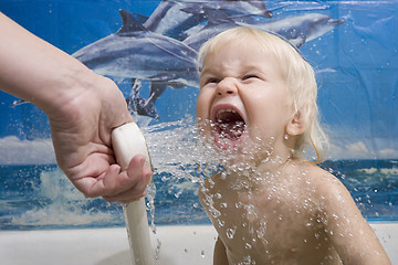 Image showing baby with douche