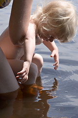 Image showing bathing baby