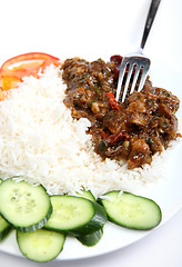 Image showing Beef szechuan with fork vertical