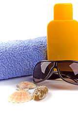 Image showing towel, sunglasses and lotion