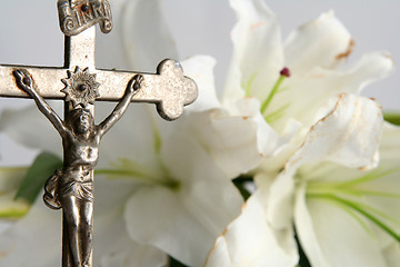 Image showing Cross and easter lilies