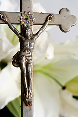 Image showing Cross and easter lilies