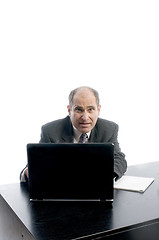 Image showing senior executive at desk successful