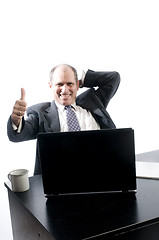 Image showing senior executive at desk successful
