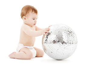 Image showing adorable baby boy with big disco ball