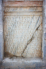 Image showing Latin text in stone