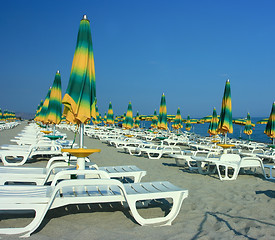 Image showing Beach with folded umbrellas