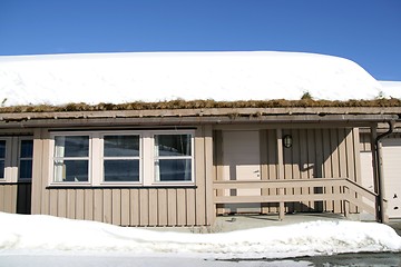 Image showing House with snowy roof