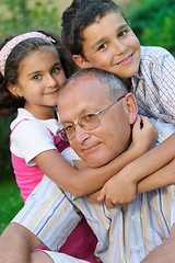 Image showing Happy grandfather and kids