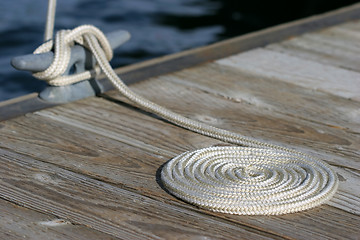 Image showing coiled rope and cleat