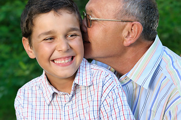 Image showing grandfather and kid outdoors