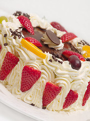 Image showing Delicious cream layer cake with strawberries