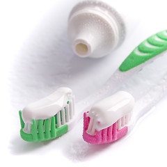 Image showing toothpaste and toothbrushes