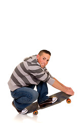 Image showing Handsome smiling skaterboy