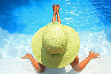 Image showing Young woman in a swimming pool