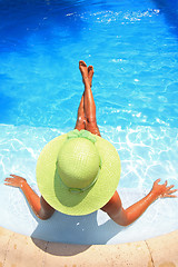 Image showing Young woman in a swimming pool