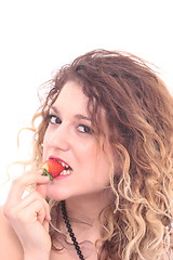 Image showing Beautiful girl holding strawberry 