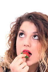 Image showing Beautiful girl holding strawberry 