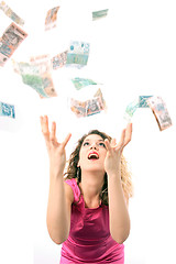 Image showing Catching money