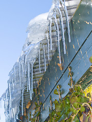 Image showing Ice hanging from a roof