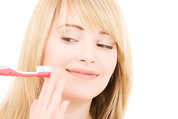 Image showing happy girl with toothbrush