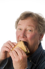 Image showing man eating large sandwich