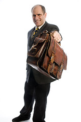 Image showing business man offering expensive leather hand bag
