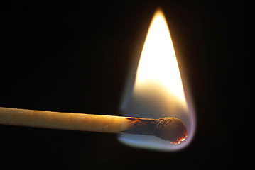 Image showing A burning Match