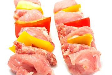 Image showing Raw meat on skewers