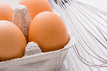 Image showing Eggs and Whisk