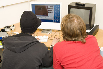 Image showing students editing video on computer