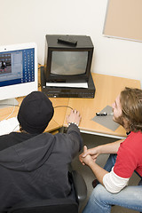 Image showing students editing video on computer