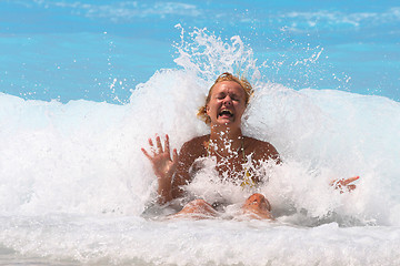 Image showing Pretty blonde woman enjoying the Ionian sea in Greece