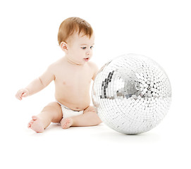 Image showing adorable baby boy with big disco ball