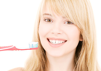 Image showing happy girl with toothbrush