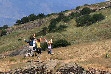 Image showing friends jumping