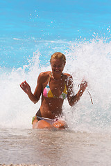 Image showing Pretty blonde woman enjoying the Ionian sea in Greece