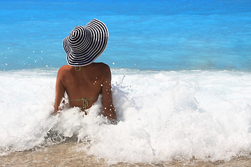 Image showing Pretty blonde woman enjoying the Ionian sea in Greece