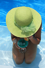 Image showing Woman in blue pool