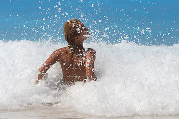 Image showing Pretty blonde woman enjoying the Ionian sea in Greece