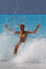 Image showing Pretty blonde woman enjoying the Ionian sea in Greece