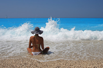 Image showing Pretty blonde woman enjoying the Ionian sea in Greece