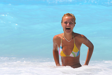 Image showing Pretty blonde woman enjoying the Ionian sea in Greece