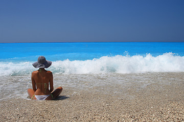 Image showing Pretty blonde woman enjoying the Ionian sea in Greece