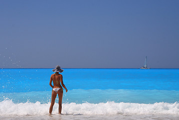 Image showing Pretty blonde woman enjoying the Ionian sea in Greece