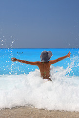 Image showing Pretty blonde woman enjoying the Ionian sea in Greece