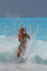 Image showing Pretty blonde woman enjoying the Ionian sea in Greece